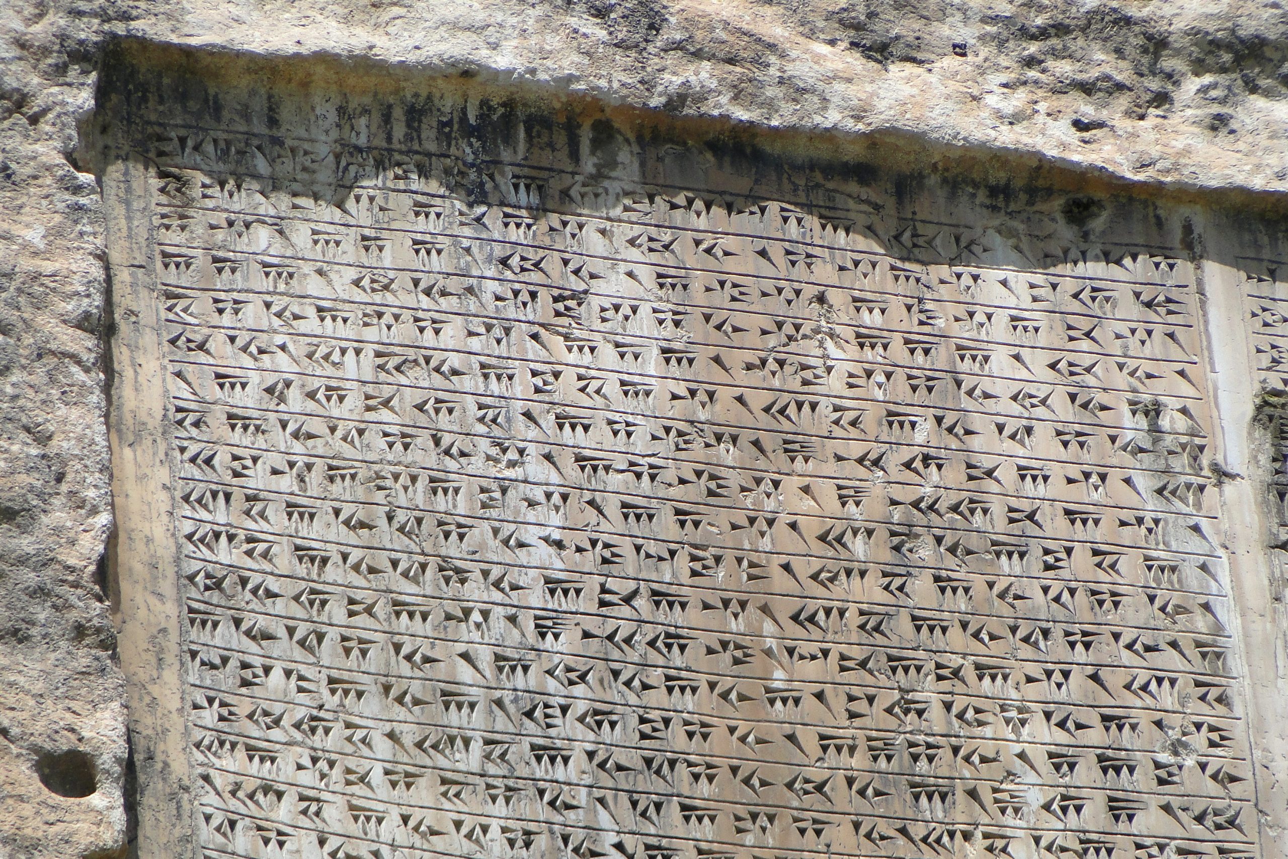 Closeup of Cuneiform Inscription of Xerxes on Cliff Face Van Castle Van Kalesi Van Turkey 5793940771 scaled